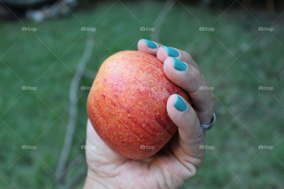 holding apple