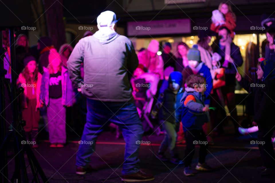 Moonlight Market in my small town is an annual pre- Christmas event on or around a full moon. It’s always an event full of twinkling lights, costumes, fun food and activities. The crowd enjoys some music and dancing.