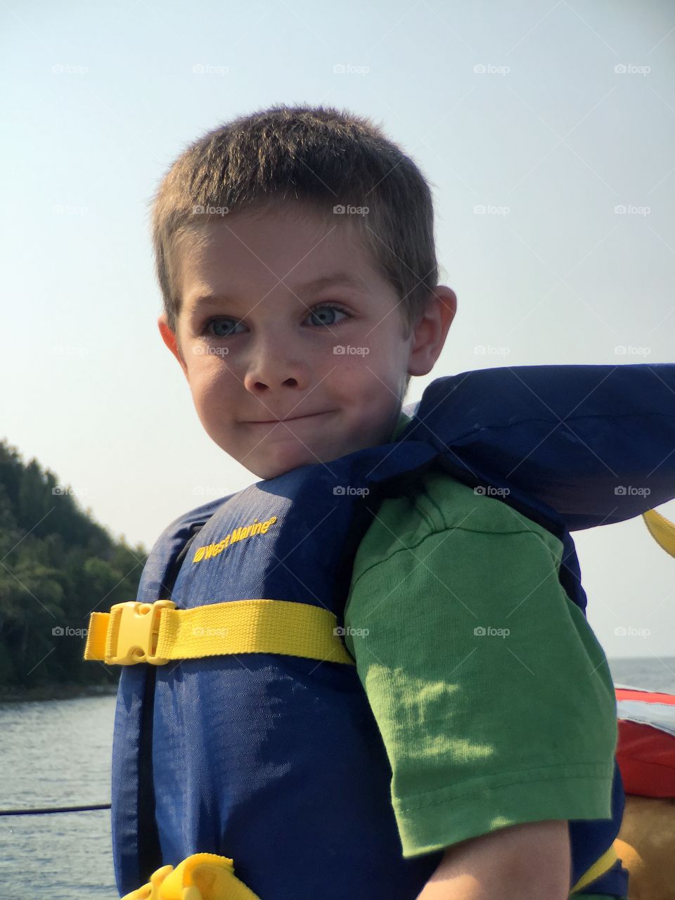 Close-up of a boy with life jacket