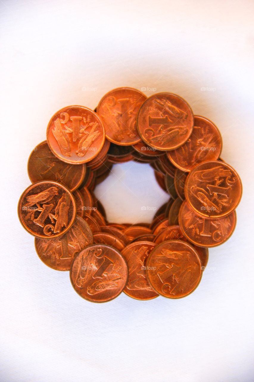 Ellipsis are all around us. This coin flower was made of many used one cent coins. We use them daily