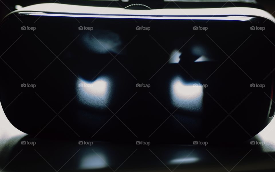 Video game ghosts appear in the viewing visors of state of the art virtual reality eyewear.