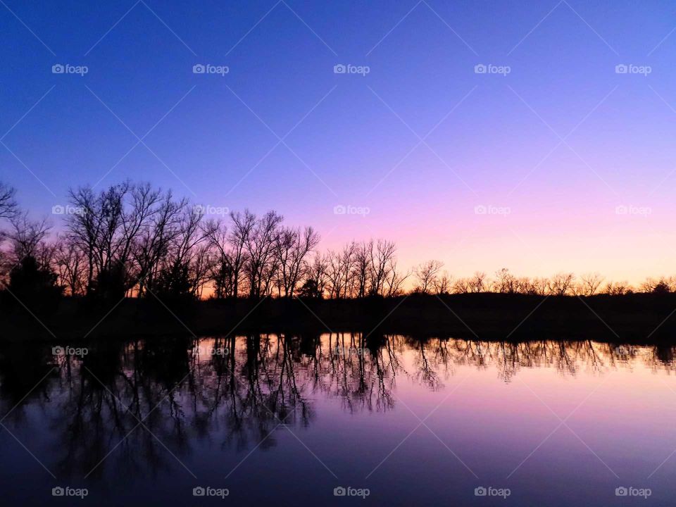 Stunning sunset over crystal clear waters. "My Favorite Photo". All Natural, no edit necessary.