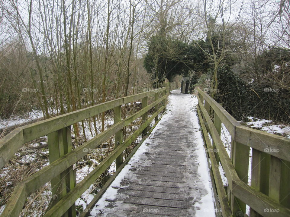 A Wooden Bridge In Winter