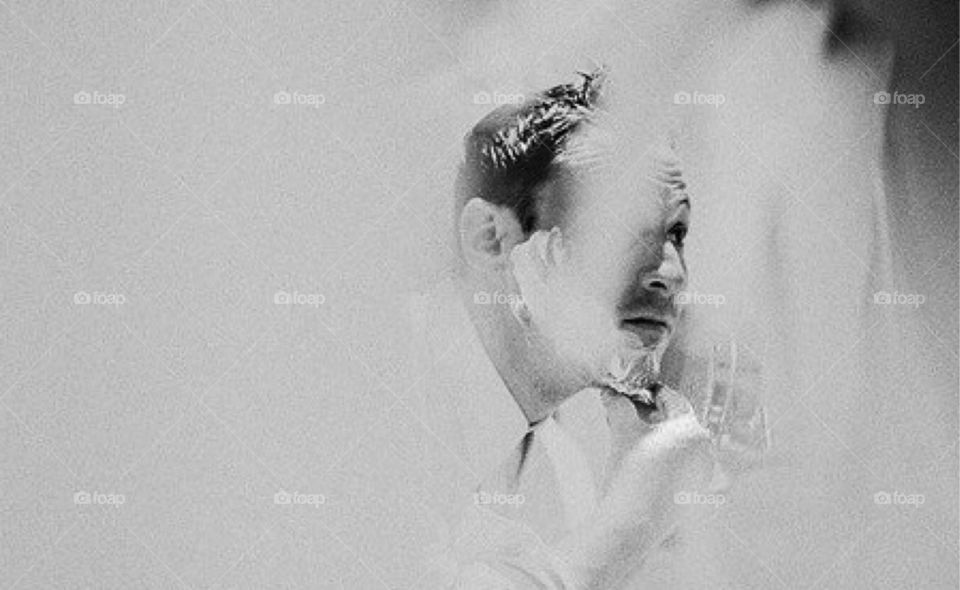 Close-up of a man shaving his beards