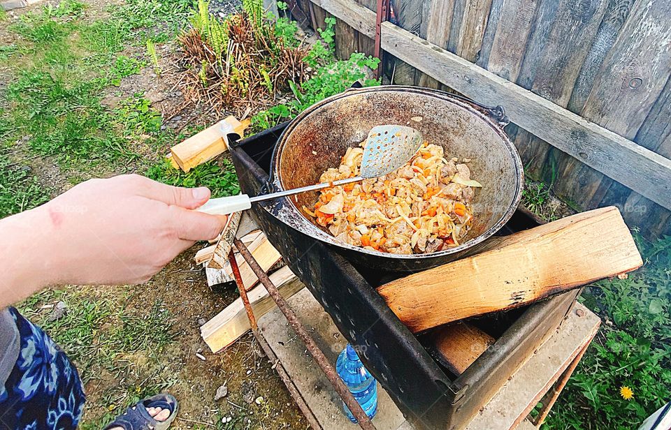 Cooking food on the campfire