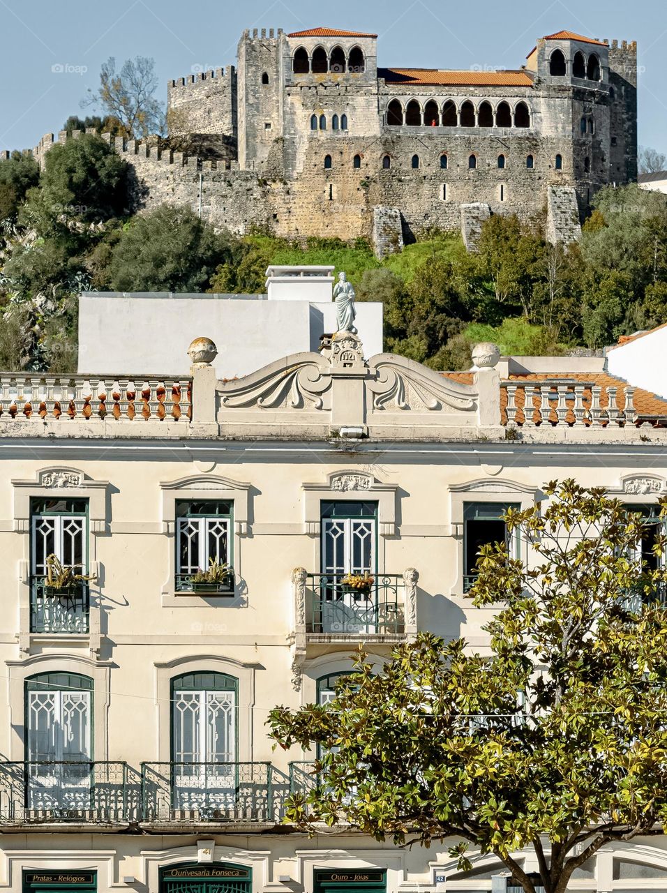 A view of the Castelo de Leiria, from Praça Francisco Rodrigues Lobo in Leiria, Portugal 