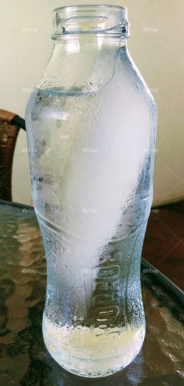 Close-up of cold bottle