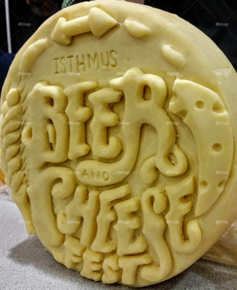 Isthmus beer and cheese festival carved cheese wheel