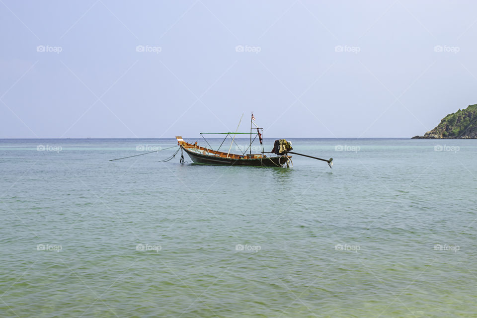 Fishing boats parked on the Beach at Haad salad , koh Phangan, Surat Thani in Thailand.