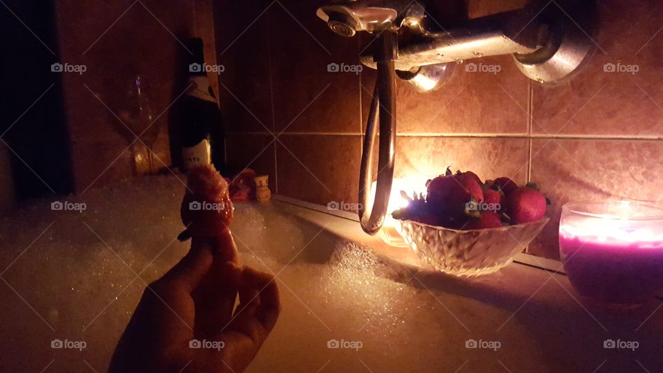 Romantic evening, dinner, champagne, strawberry, fruit, bath