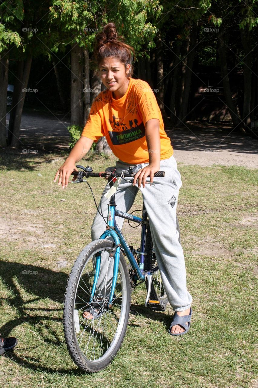 Teen girl on a bicycle