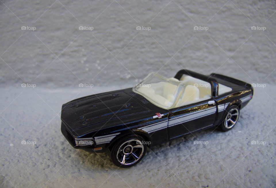 Miniature convertible black car