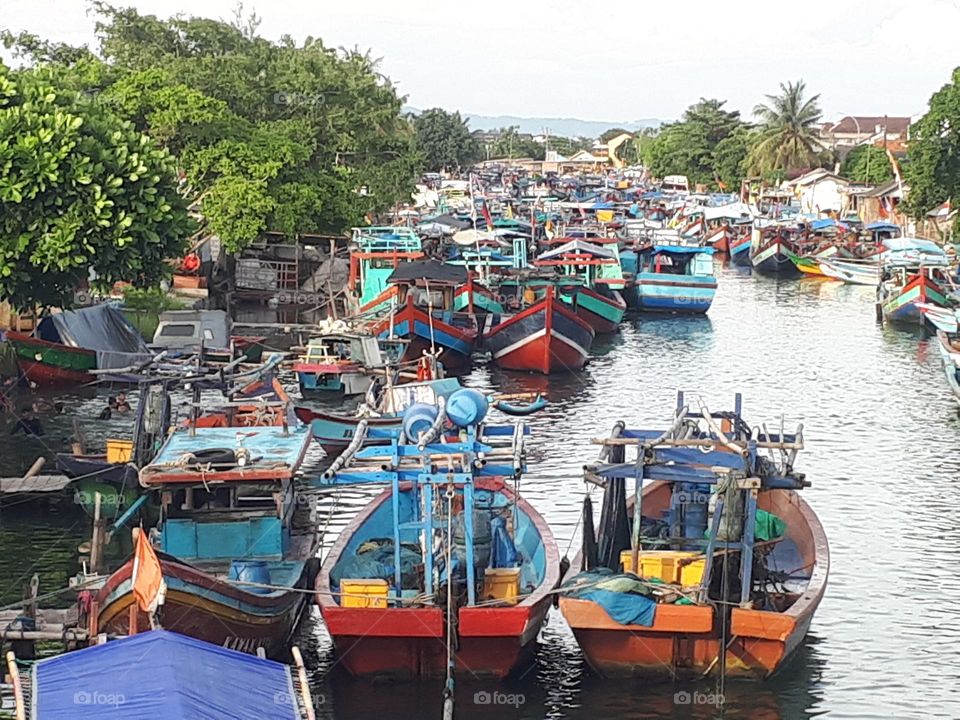 fishing boat dock in cilacap, indonesia