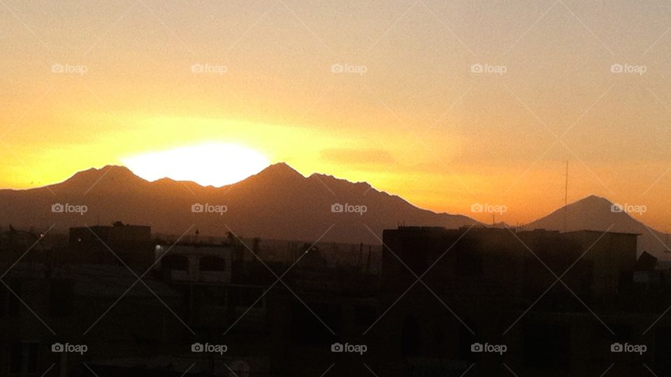 Sunset behind mountains in Peru