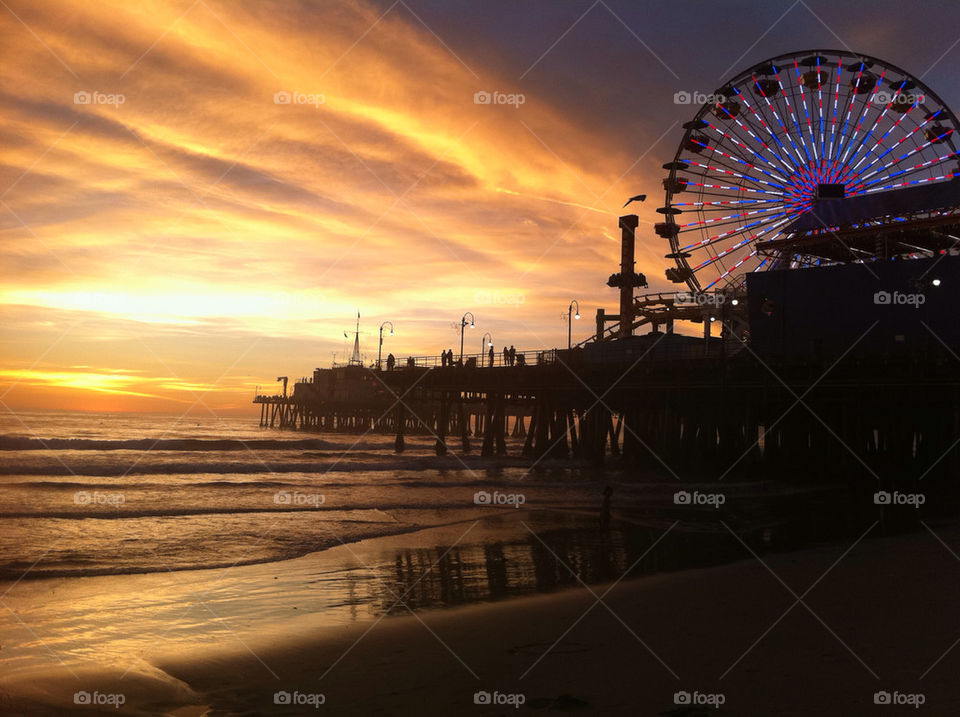 ferris wheel sunset pier by blueyedhoney