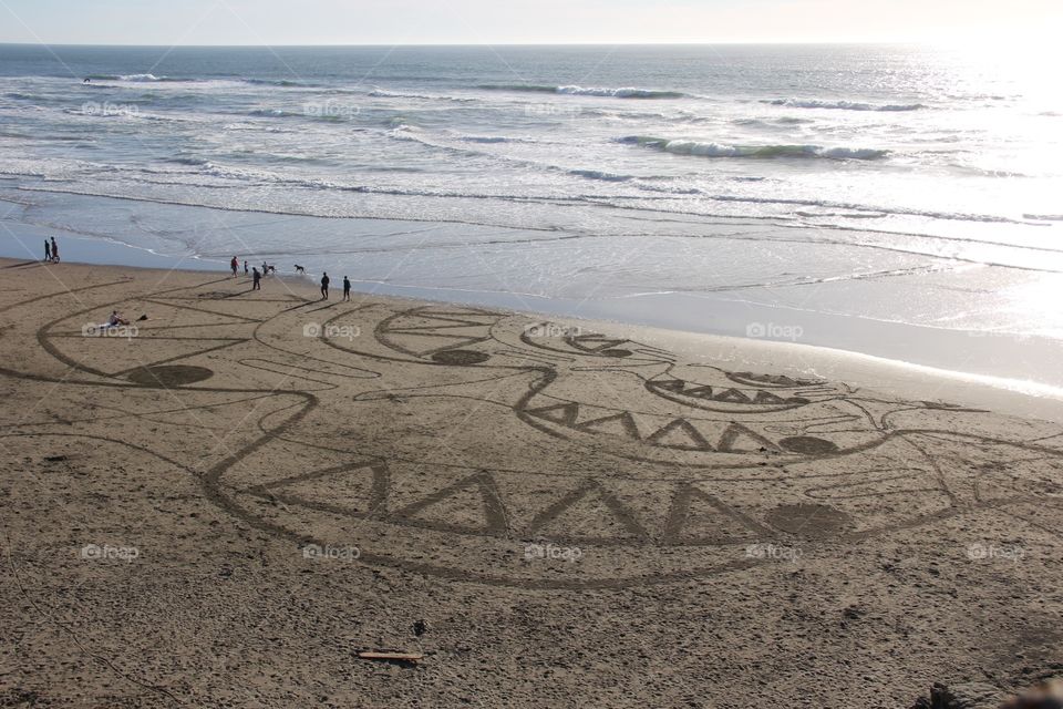 Drawing on the beach 