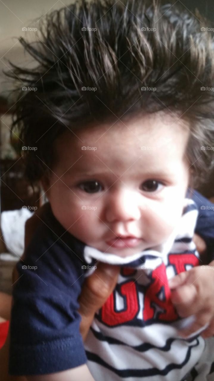 Cute baby faces 1 month old baby Nedie with plenty of hair