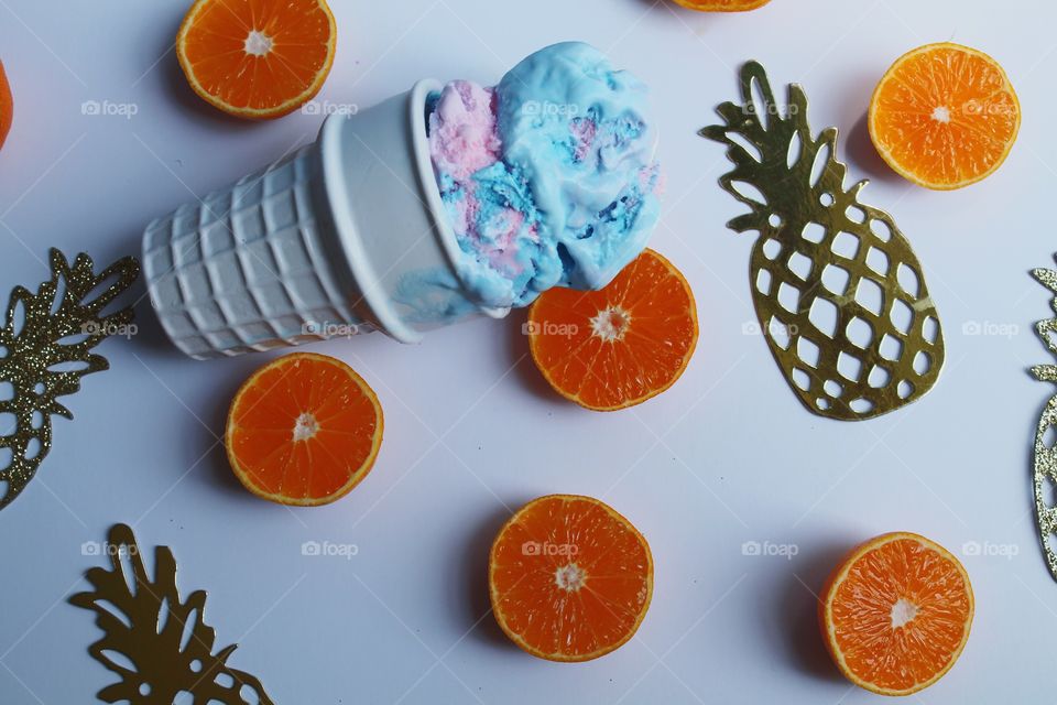High angle view of ice cream with orange slice