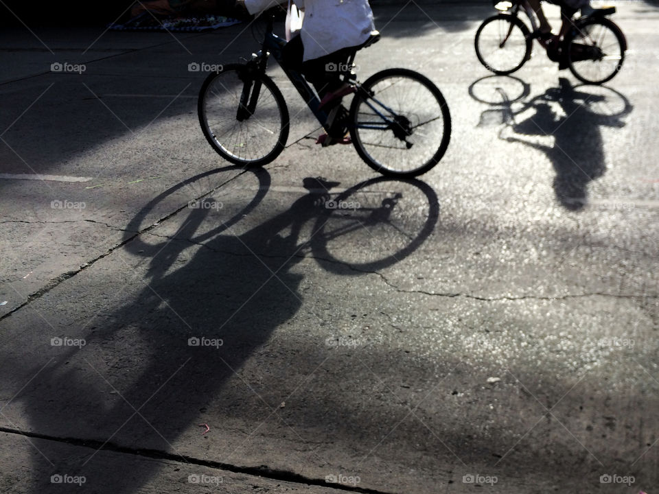 Bicycle and shadow on street background