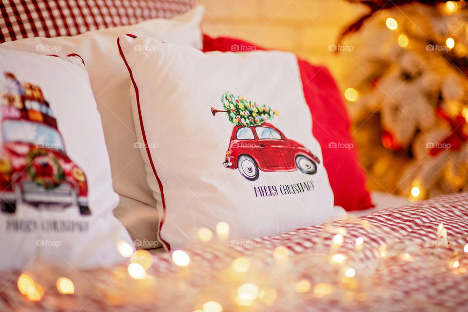 Christmas decorated pillow, festive atmosphere. Home decor.