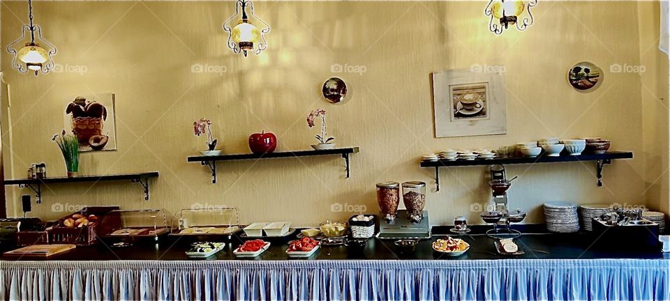 The buffet is served and breakfast is ready for the hotel guests at the „Pension Margrit“ in „Wilmersdorf“, „Berlin“, Germany. The „Kurfürstendamm“, the main drag around here is not far away from here. 2023. Hypnotic Productions