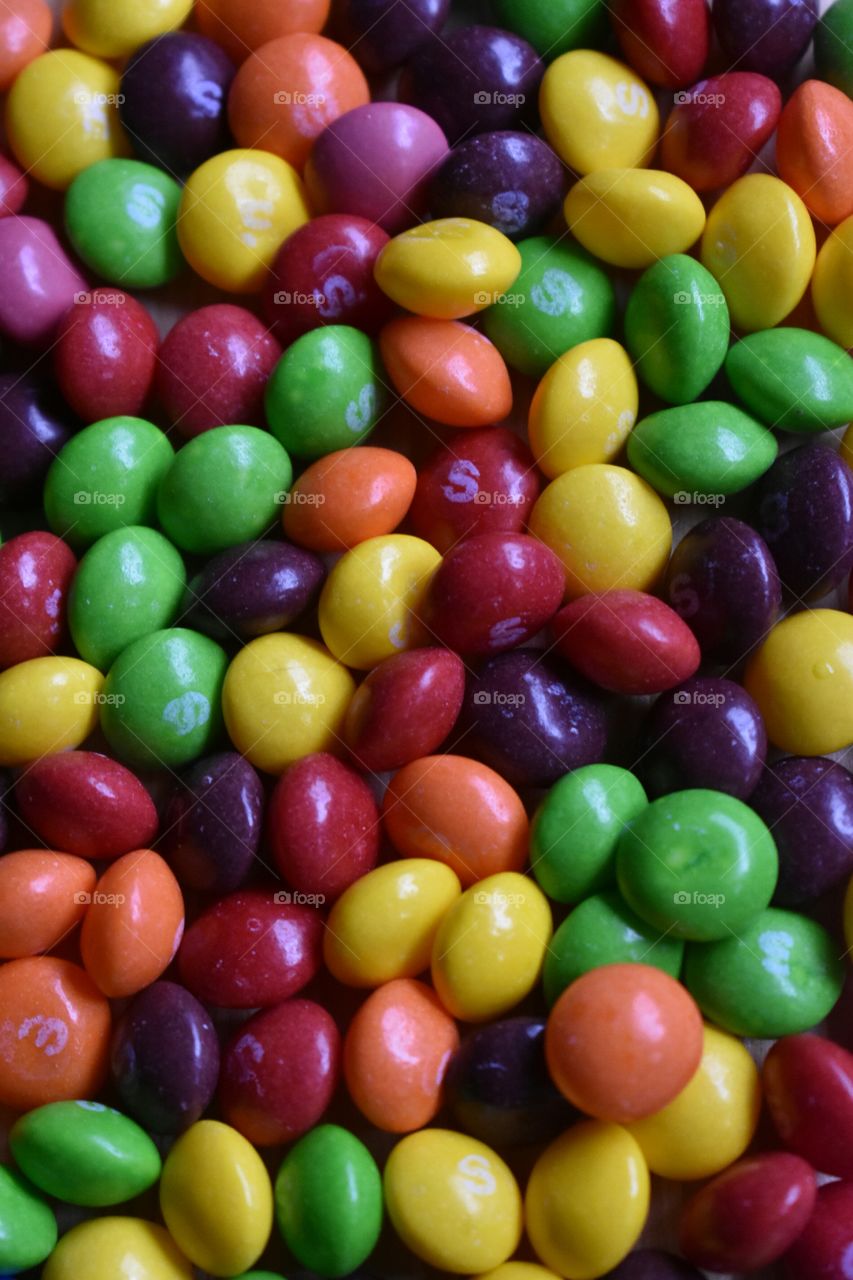 lots of colorful Skittles