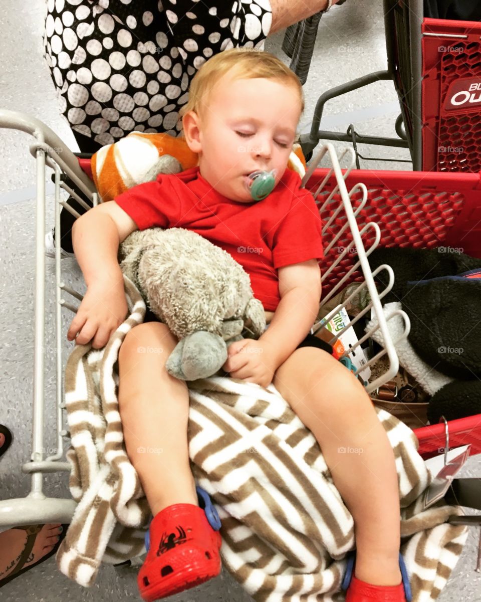 Sleeping baby in a buggy