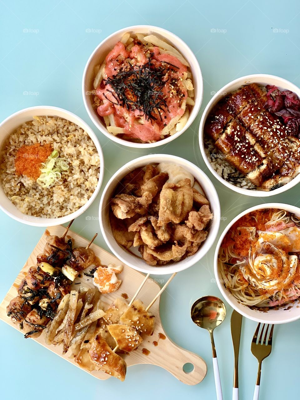 Japanese food delivery - grilled unagi don, garlic fried rice , yakitori sticks , angels lover and chicken karage 