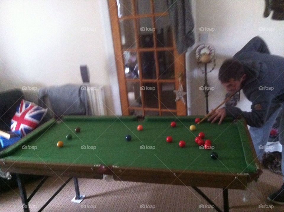 playing pool in the living room. trip to scotland