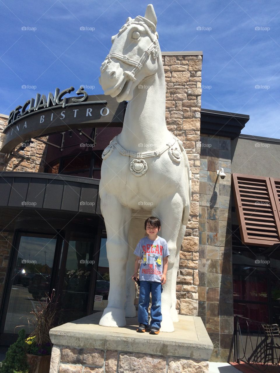 Pf Chang horse. my son standing by the Pf Chang horse. 