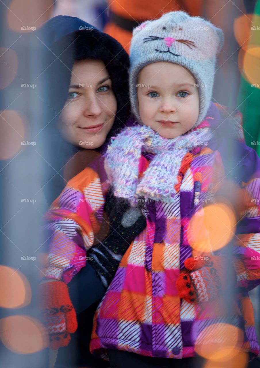 Portrait of mom and little daughter 