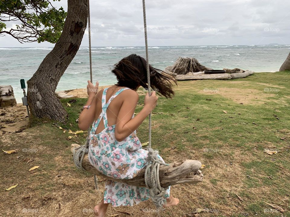 Swinging by the beach
