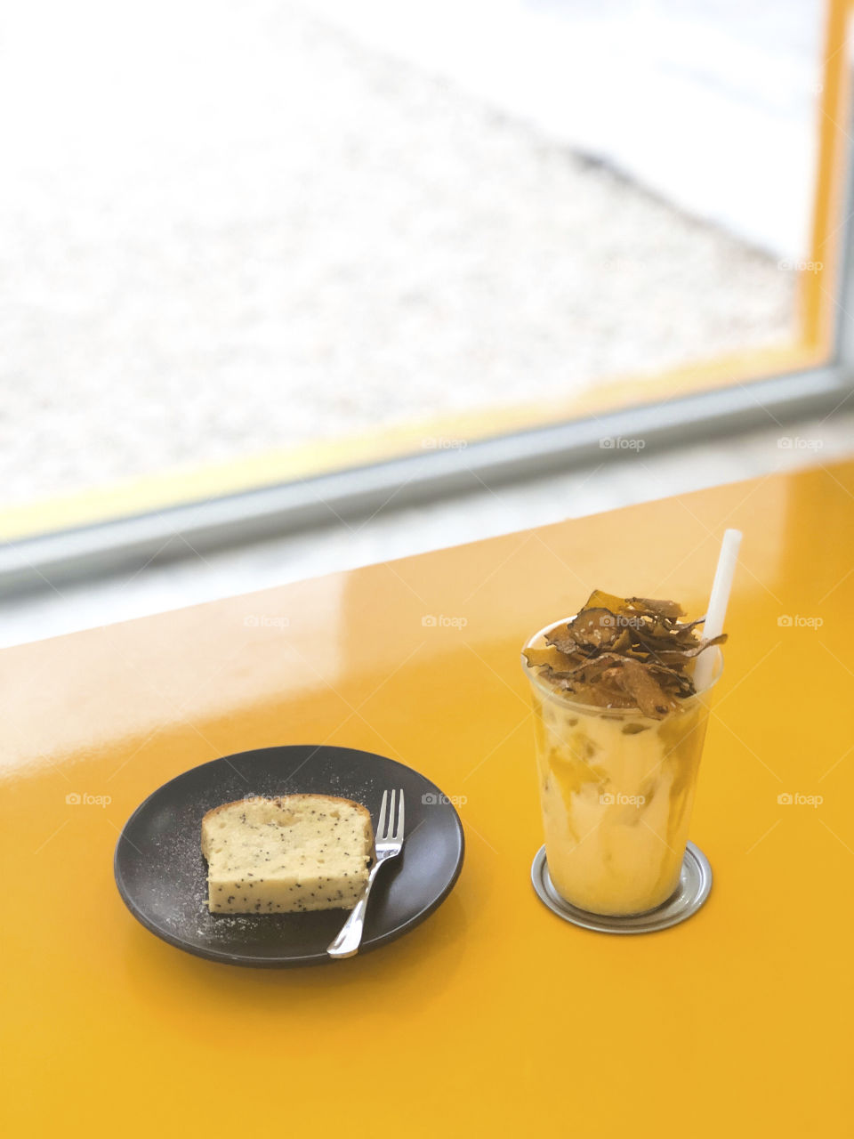 Butter cake and a cold drink for dessert