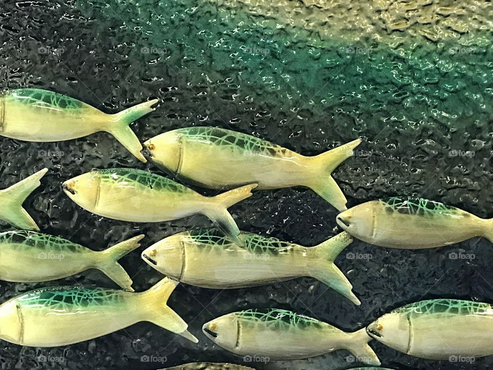 Green metallic fish art