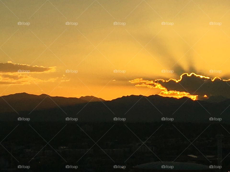 Denver Colorado at Sunset with Mountains in the Distance 