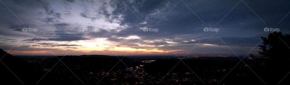 Dawn. Photo of the sun rising over Golden, Colorado as seen from atop Lookout Mountain.