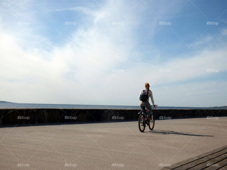 girl riding bicycle. girl riding bicycle, relaxing