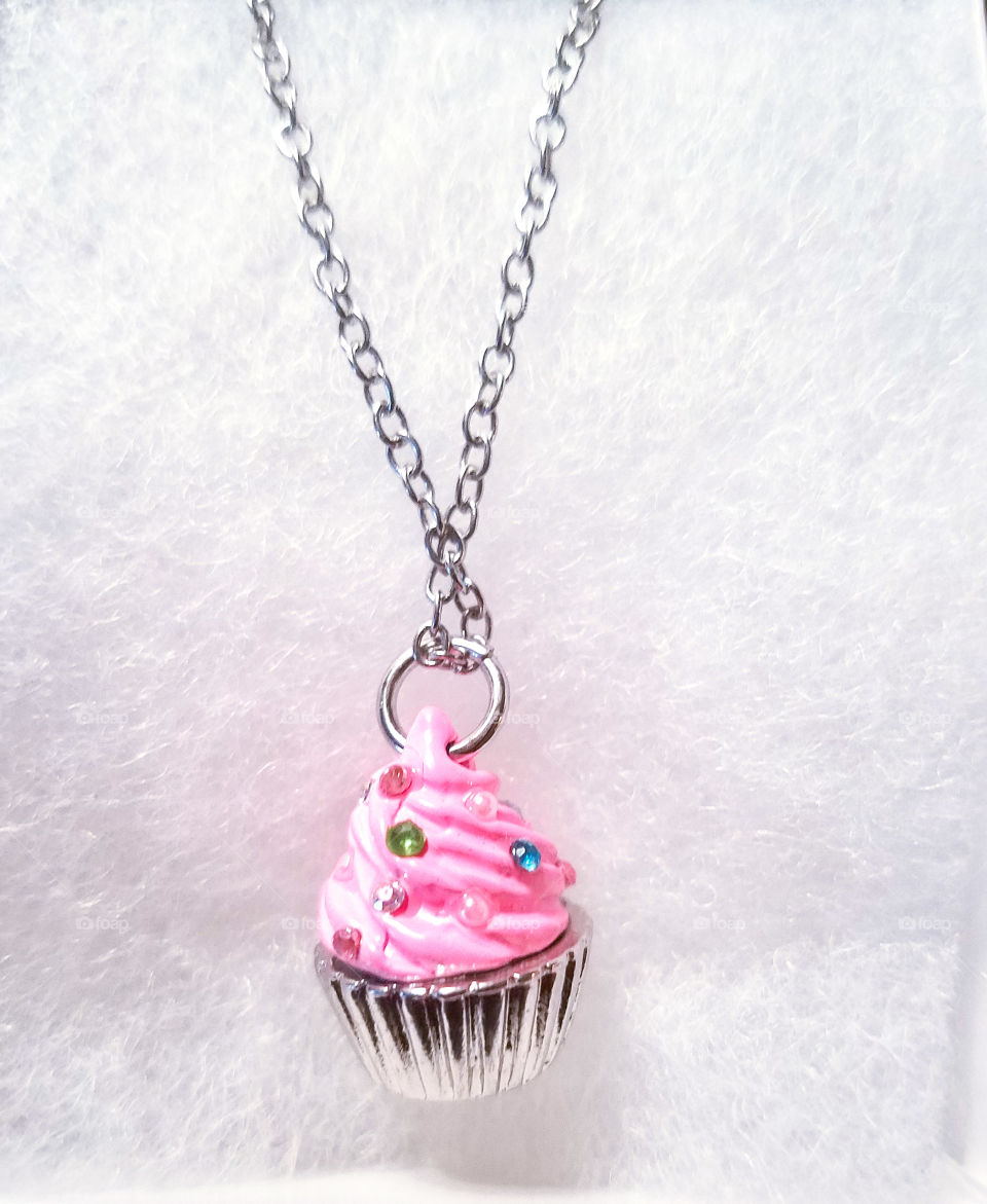 Cupcake necklace.