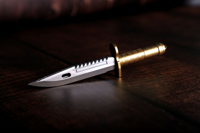 Silver Dagger knife on dark background