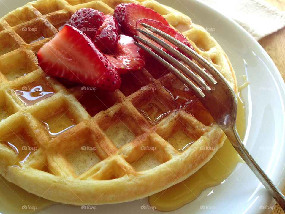 Waffle with fresh strawberries
