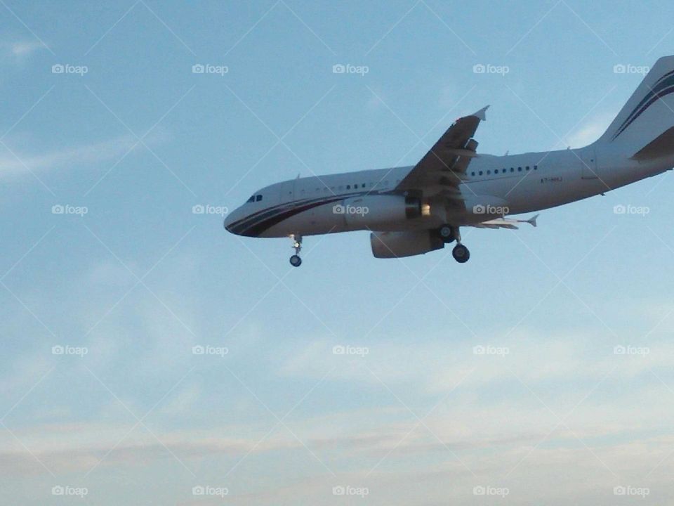 beautiful airplane flying cross the sky.