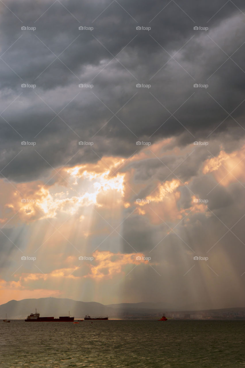 Sunlight falling through clouds