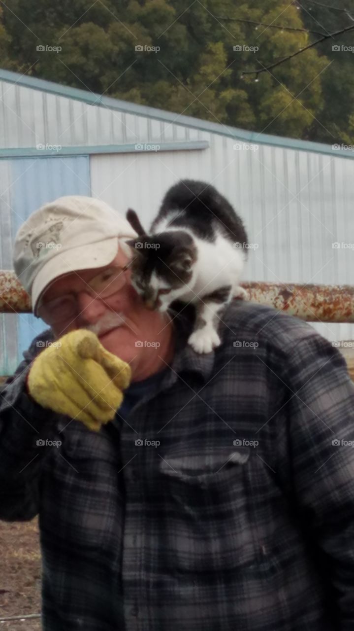 man and cat