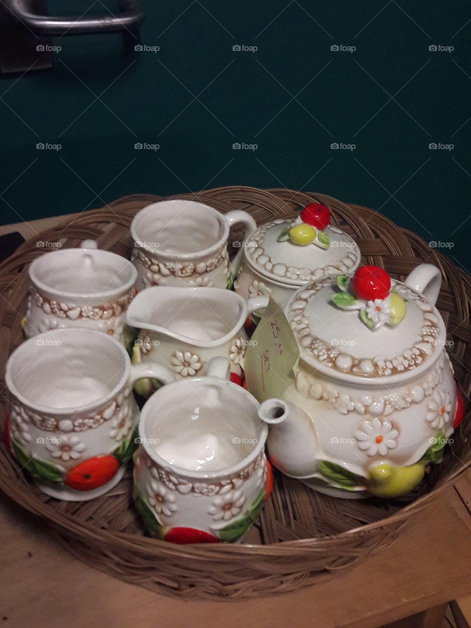 a tea set in a thrift store waiting to be bought.