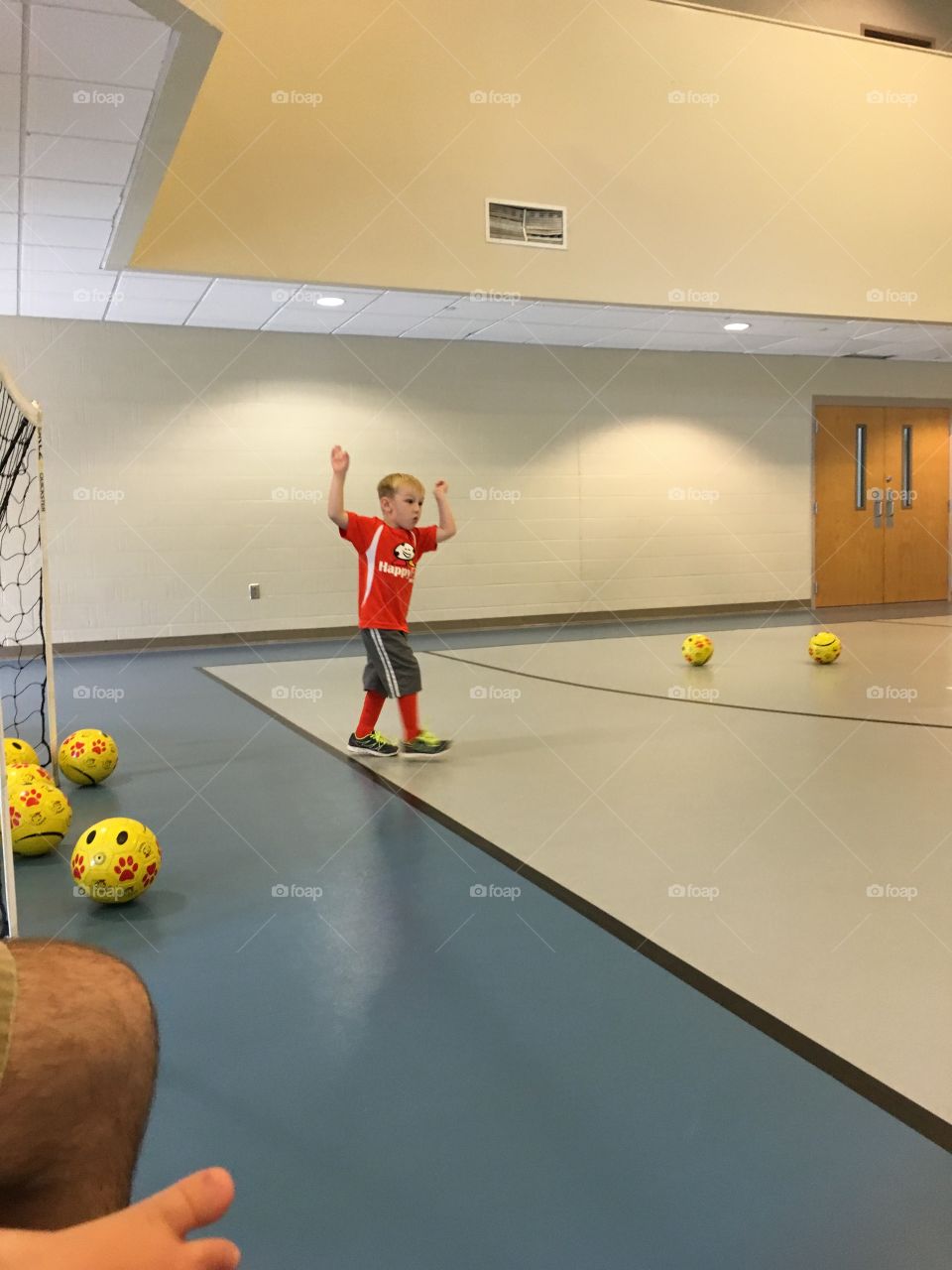 Happy face soccer ball and player 