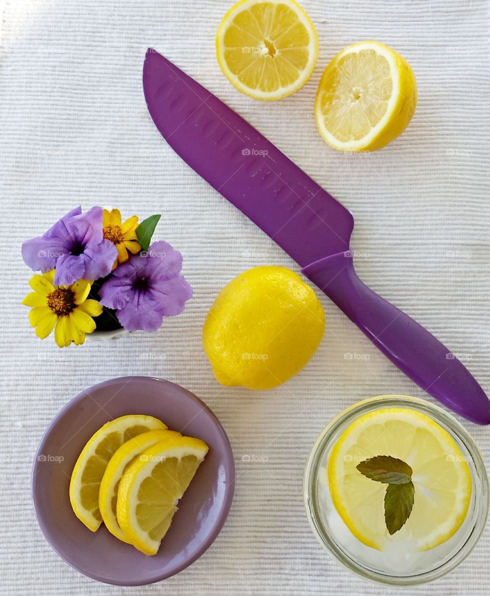 lemons and purple knife / yellow and purple