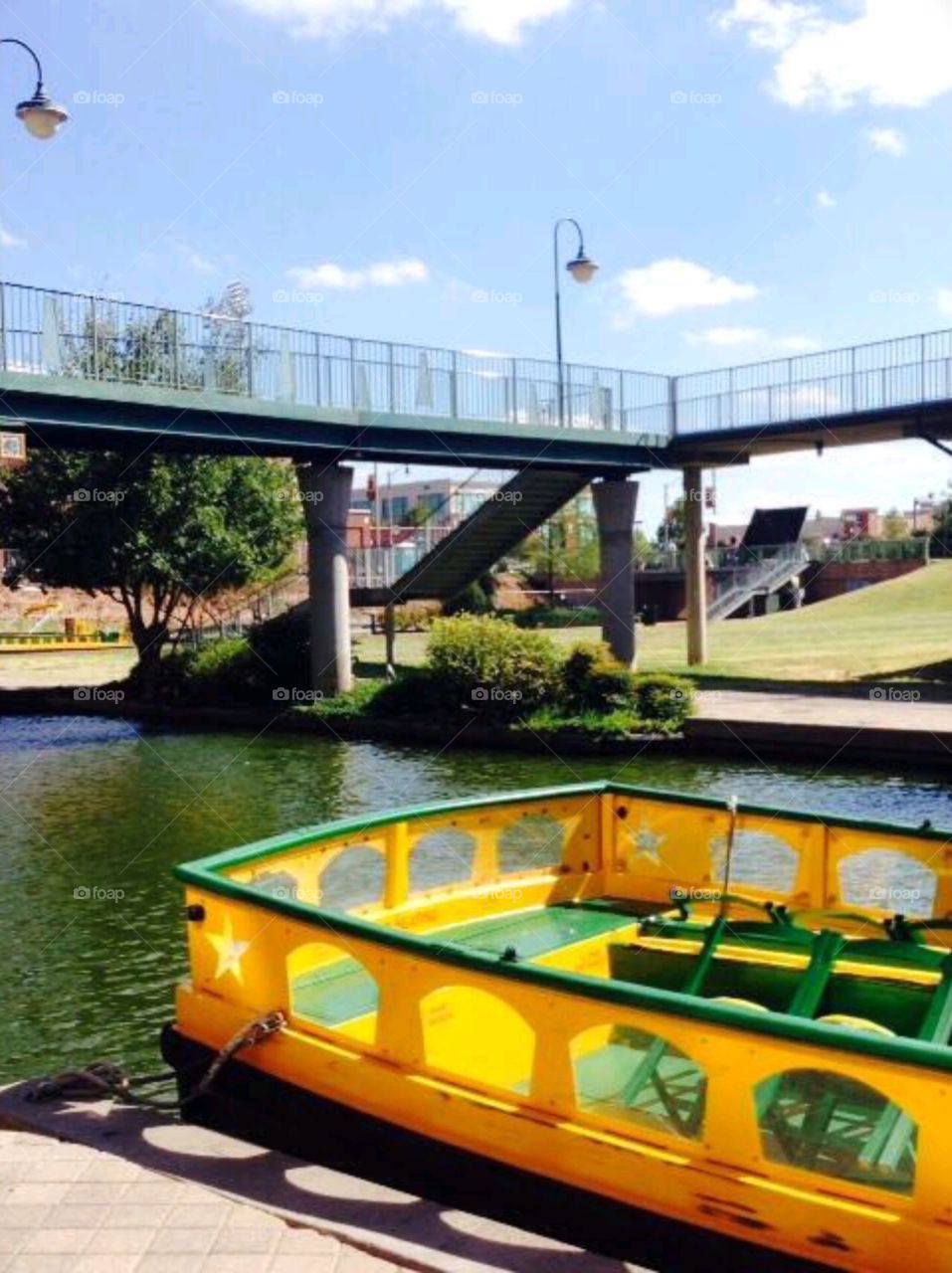 Yellow tour boat. Brick town OKC 