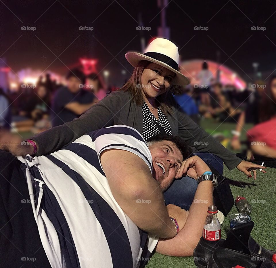 Man lying on wife’s lap 