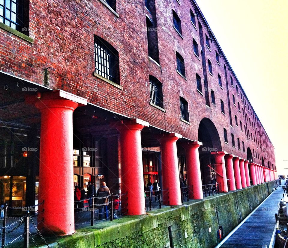 red buildings warehouse pillars by jeanello