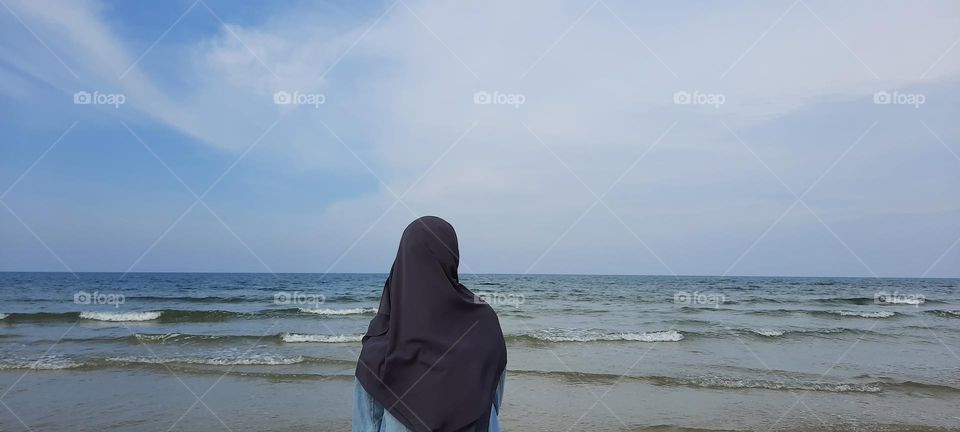 Girl watching the wave